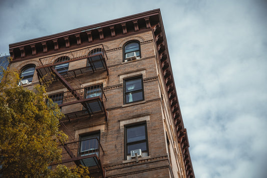 a building with windows and balconies